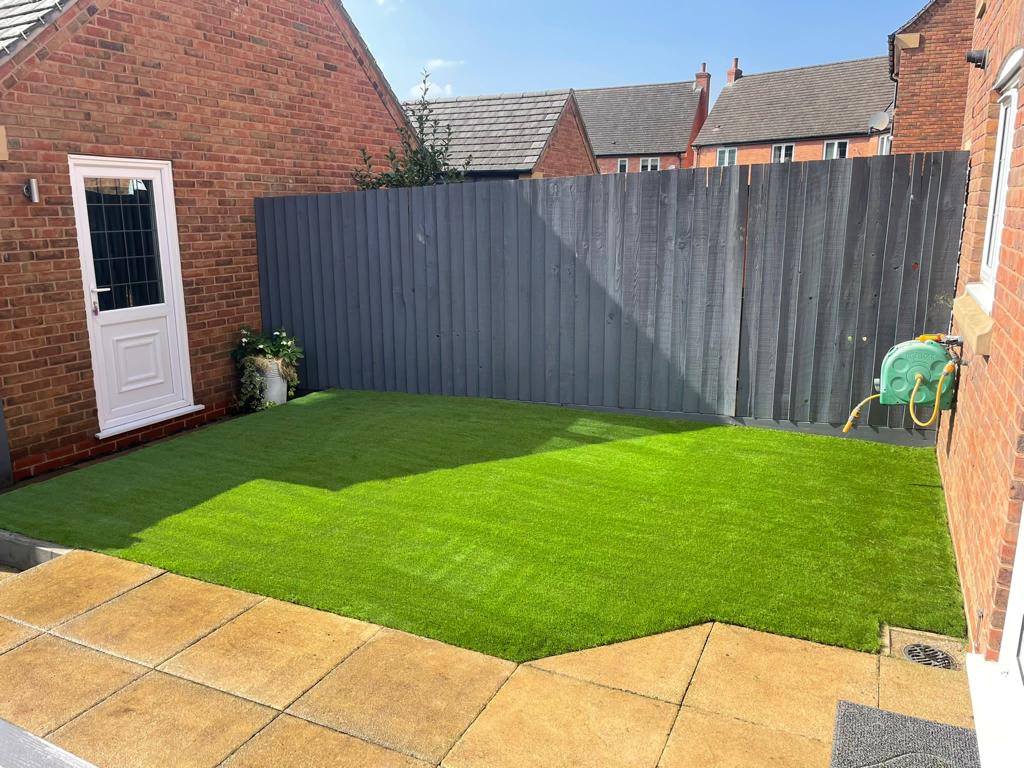 This is a photo of a recently landscaped garden in Leicester. Leicester artificial grass services carried this out