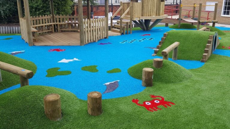 This is a photo of a children's outdoor adventure playground. Leicester artificial grass services installed the artificial turf